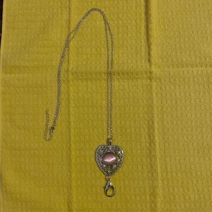 silver and pink necklace with earrings